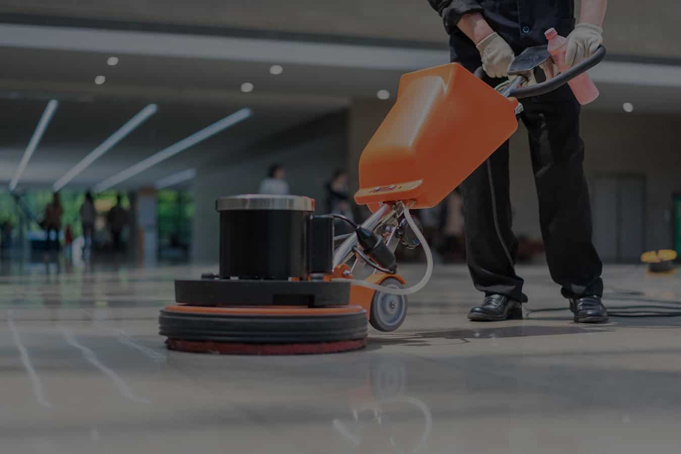 washing floor with machine Orlando and Tampa Commercial Cleaning Company