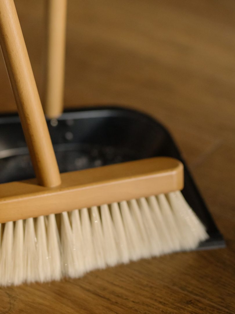 Clean commercial office building hallway with polished floors and proper janitorial care